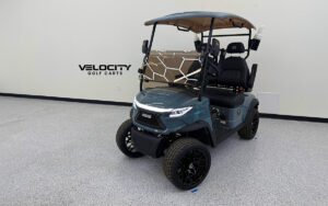 Gun Metal Grey 2025 Venom EV Strike 2-Passenger Golf Cart with 10" touchscreen, Apple CarPlay, custom-stitched seats, dual suspension, and 4-wheel disc brakes