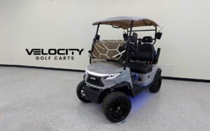 Nardo Grey 2025 Venom EV Strike 2-Passenger Golf Cart with 10" touchscreen, Apple CarPlay, custom stitched seats, dual suspension, and 4-wheel disc brakes
